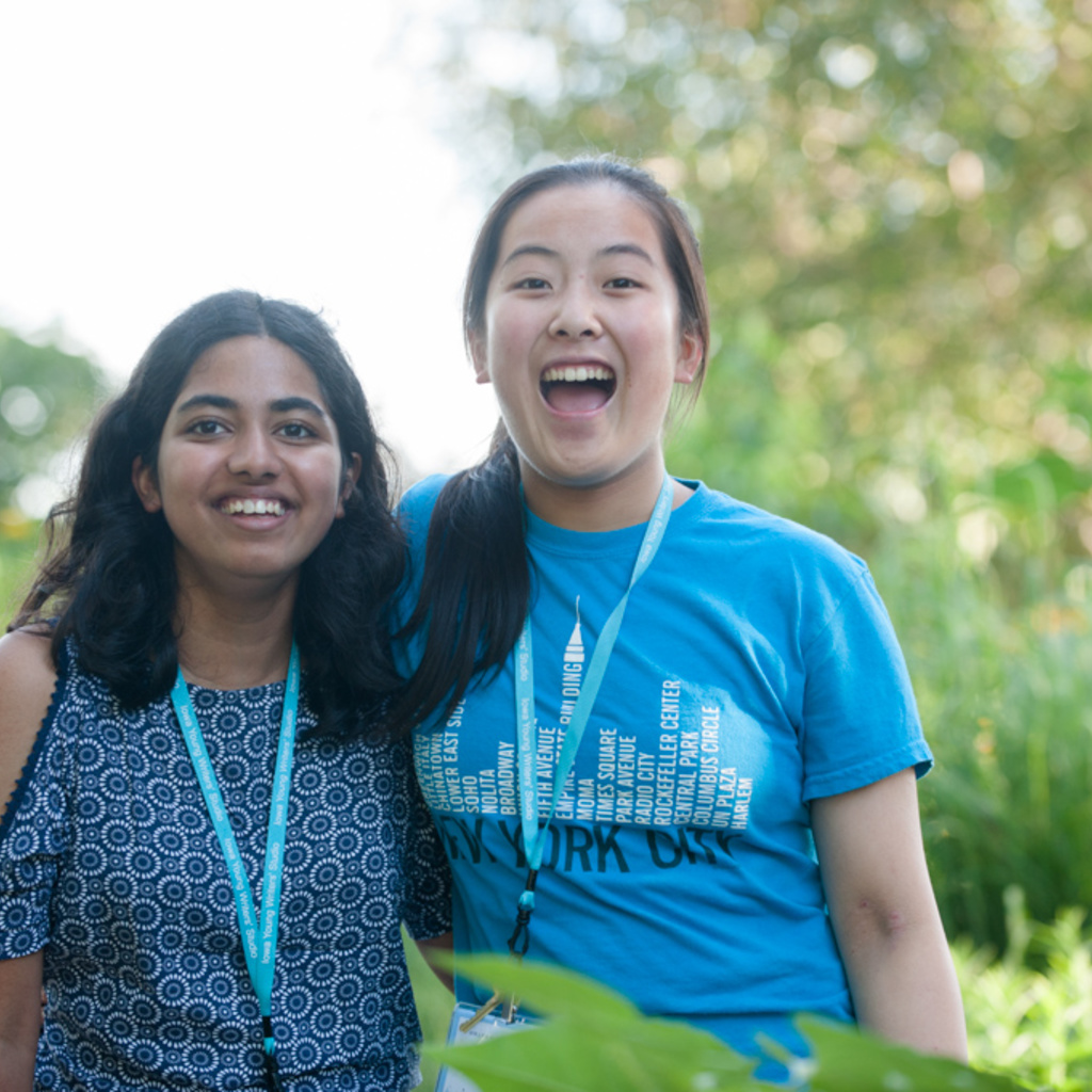 Two students outdoors at summer writing camp